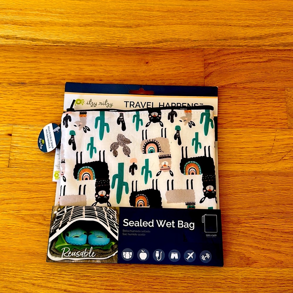 New with tags Itzy Ritzy Travel happens sealed wet bag 11inch x 14 inches